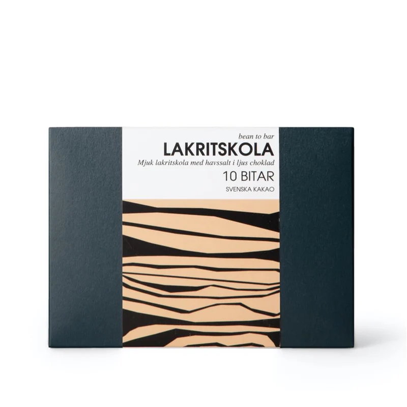 Presentask med mjuk lakritskola doppad i mjölkchoklad